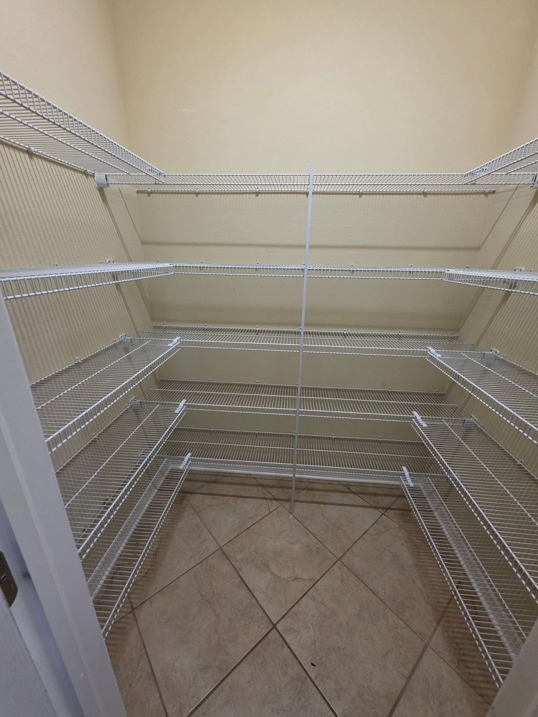 Builder-grade pantry before remodel, Clermont FL