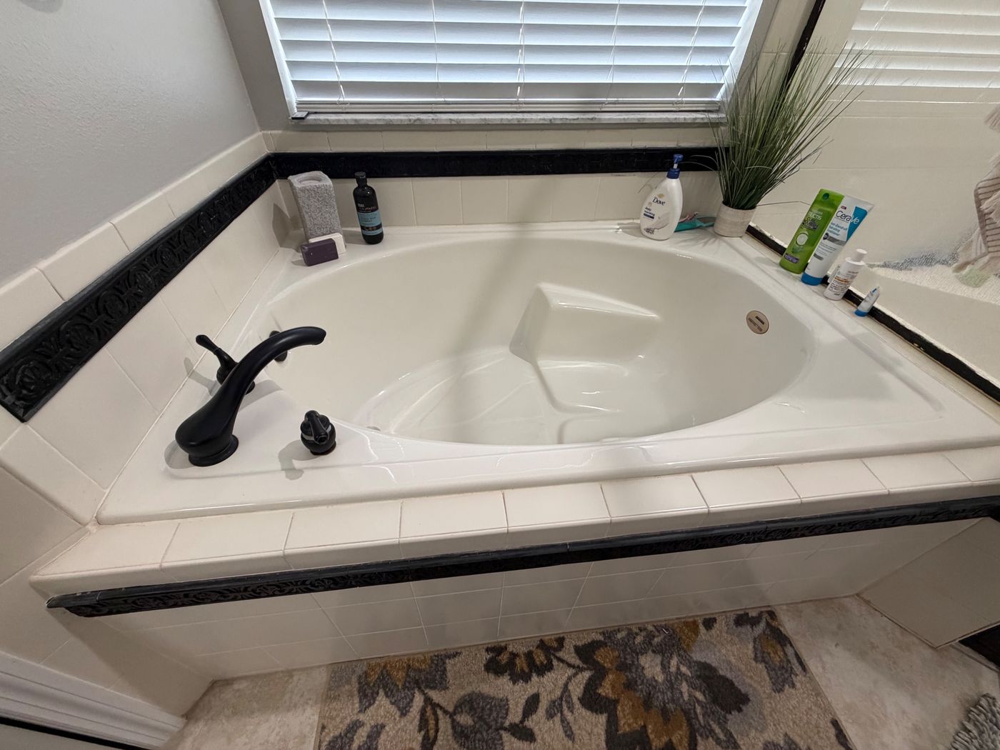 Bathtub caulk line before recaulking, Groveland FL